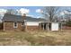 Brick house exterior with sunroom addition at 927 Bellvue St, Burlington, NC 27217