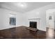 Living room with hardwood floors and fireplace at 927 Bellvue St, Burlington, NC 27217