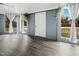 Sunroom with gray walls, wood-look floors, and a view at 927 Bellvue St, Burlington, NC 27217