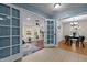 Inviting room with office and dining area, featuring lots of natural light and hardwood flooring at 100 Forestwood Dr, Durham, NC 27707