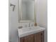 Clean bathroom with modern vanity and large mirror at 1015 Epiphany Rd, Morrisville, NC 27560