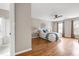 Spacious main bedroom with hardwood floors, large windows and an adjoining tiled bathroom at 103 Sandy Hook Way, Cary, NC 27513