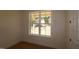 Bright bedroom featuring neutral walls, carpeted floors, and windows providing ample natural light at 1104 Opal Ln # 104, Durham, NC 27705