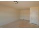 Bright bedroom featuring neutral walls, base trim and overhead lighting at 1104 Opal Ln # 104, Durham, NC 27705
