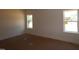 Spacious bedroom featuring bright windows and neutral walls ready for personalization at 1104 Opal Ln # 104, Durham, NC 27705