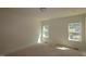 Bedroom with natural light, neutral walls, and space for customization at 1109 Opal Ln # 71, Durham, NC 27705