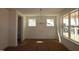 Elegant dining room with large windows, a modern chandelier, and ample space for entertaining at 1109 Opal Ln # 71, Durham, NC 27705