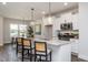 Modern kitchen with white cabinets and granite countertops at 111 Weavers Grove Dr # 102, Chapel Hill, NC 27514