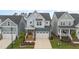 Two-story home with attached garage and charming front yard at 1141 Logperch Way, Wendell, NC 27591