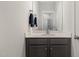 Small bathroom with a vanity, sink, and a mirror at 1141 Logperch Way, Wendell, NC 27591