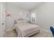 Bedroom with a double bed, neutral decor, and natural light at 1141 Logperch Way, Wendell, NC 27591