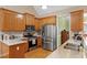 Modern kitchen featuring granite countertops and stainless steel appliances at 118 Watersedge Ln, Smithfield, NC 27577