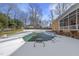 Inground pool with cover; winter view with snow at 12016 Pembridge Ln, Raleigh, NC 27613