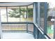 Relaxing screened porch with wooden deck and backyard view at 1218 Auburn Village Dr, Durham, NC 27713