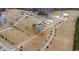An aerial view of a large property with multiple buildings and a long private driveway at 14425 Nc-96 N Hwy, Zebulon, NC 27597