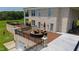 Aerial view of the house featuring an outdoor deck with an outdoor seating set and landscaping at 14425 Nc-96 N Hwy, Zebulon, NC 27597