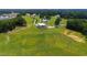 Aerial view of property, home and landscaped yard at 14425 Nc-96 N Hwy, Zebulon, NC 27597