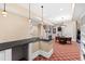 Basement bar area with a popcorn machine and barstools at 14425 Nc-96 N Hwy, Zebulon, NC 27597