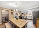 Bright dining area with a wooden table and kitchen views at 14425 Nc-96 N Hwy, Zebulon, NC 27597