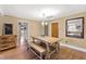 Charming dining room with a farmhouse table and bench seating at 14425 Nc-96 N Hwy, Zebulon, NC 27597
