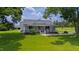 Charming single-story home featuring a classic front porch and manicured lawn exudes curb appeal at 14425 Nc-96 N Hwy, Zebulon, NC 27597