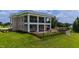 Scenic patio with elegant outdoor seating, offering serene views of the lush green landscape at 14425 Nc-96 N Hwy, Zebulon, NC 27597