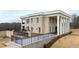 Exterior of a two-story home with columns and a patio at 14425 Nc-96 N Hwy, Zebulon, NC 27597