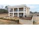 Two-story house with a large wrap-around porch and gated backyard at 14425 Nc-96 N Hwy, Zebulon, NC 27597