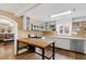 Kitchen with butcher block island and white cabinets at 14425 Nc-96 N Hwy, Zebulon, NC 27597