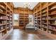 Elegant library with built-in shelves and hardwood floors at 14425 Nc-96 N Hwy, Zebulon, NC 27597