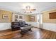 Spacious living room with hardwood floors and large windows at 14425 Nc-96 N Hwy, Zebulon, NC 27597