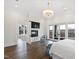 Main bedroom with fireplace, sitting area, and access to a private balcony at 14425 Nc-96 N Hwy, Zebulon, NC 27597