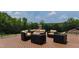 Outdoor deck featuring an outdoor seating set and views of the lush green trees at 14425 Nc-96 N Hwy, Zebulon, NC 27597