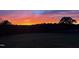 Fiery sunset view over the property's landscape at 14425 Nc-96 N Hwy, Zebulon, NC 27597