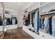 Large walk-in closet with custom shelving and hanging space at 14425 Nc-96 N Hwy, Zebulon, NC 27597