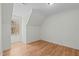 Bright bedroom with wood floors and a window offering natural light at 145 Beaver Ridge Dr, Youngsville, NC 27596