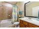 Bathroom with tub, shower, and updated vanity at 1486 Orchard Villas Ave, Apex, NC 27502