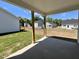 View from the covered patio of the spacious backyard and surrounding neighborhood at 150 W Saltgrass Ln, Smithfield, NC 27577