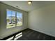 Bright bedroom with a large window and plush carpeting, offering a cozy and inviting space at 150 W Saltgrass Ln, Smithfield, NC 27577