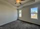 Cozy bedroom featuring ample natural light, neutral walls, plush carpet and tray ceiling at 150 W Saltgrass Ln, Smithfield, NC 27577