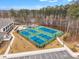 Community tennis courts near clubhouse and pool at 1509 Hornbeam Rd, Fuquay Varina, NC 27526