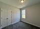 Bright bedroom with a closet and a large window offering natural light at 160 W Saltgrass Ln, Smithfield, NC 27577