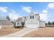Two-story house with a spacious yard and attached garage at 1704 Little Drake Ave, Willow Springs, NC 27592
