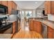 Kitchen with stainless steel appliances and light wood cabinets at 1704 Little Drake Ave, Willow Springs, NC 27592