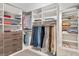 Spacious walk-in closet with ample shelving and hanging space at 1704 Little Drake Ave, Willow Springs, NC 27592