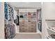 Large walk-in closet with ample shelving and hanging space at 1704 Little Drake Ave, Willow Springs, NC 27592