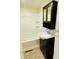 Clean bathroom with tub, sink vanity, and mirrored medicine cabinet at 1716 Turner St, Roxboro, NC 27573