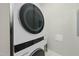 Convenient laundry area with stacked washer and dryer at 200 S Dawson St # 406, Raleigh, NC 27601