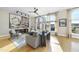 Bright living room featuring hardwood floors and city views from large windows at 200 S Dawson St # 406, Raleigh, NC 27601
