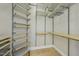 Spacious walk-in closet with ample shelving and hanging space at 200 S Dawson St # 406, Raleigh, NC 27601